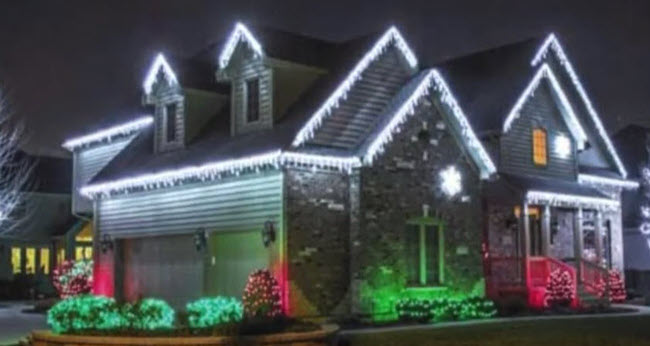house lit up with lights
