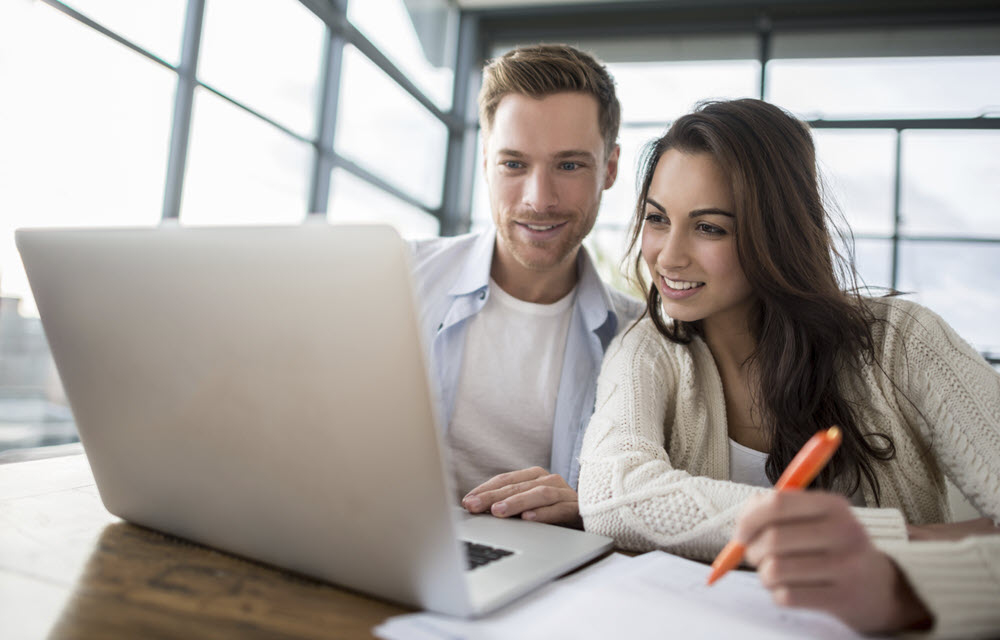 young couple on computer