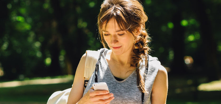 woman checking phone